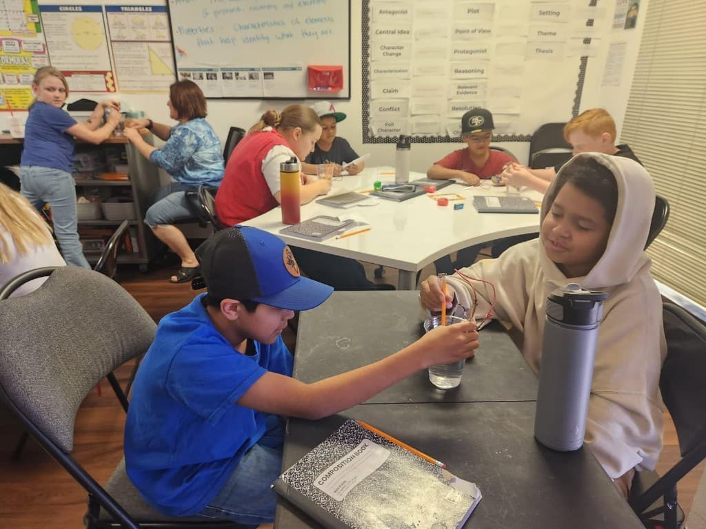 Students working together in a Community Schoolhouse classroom.